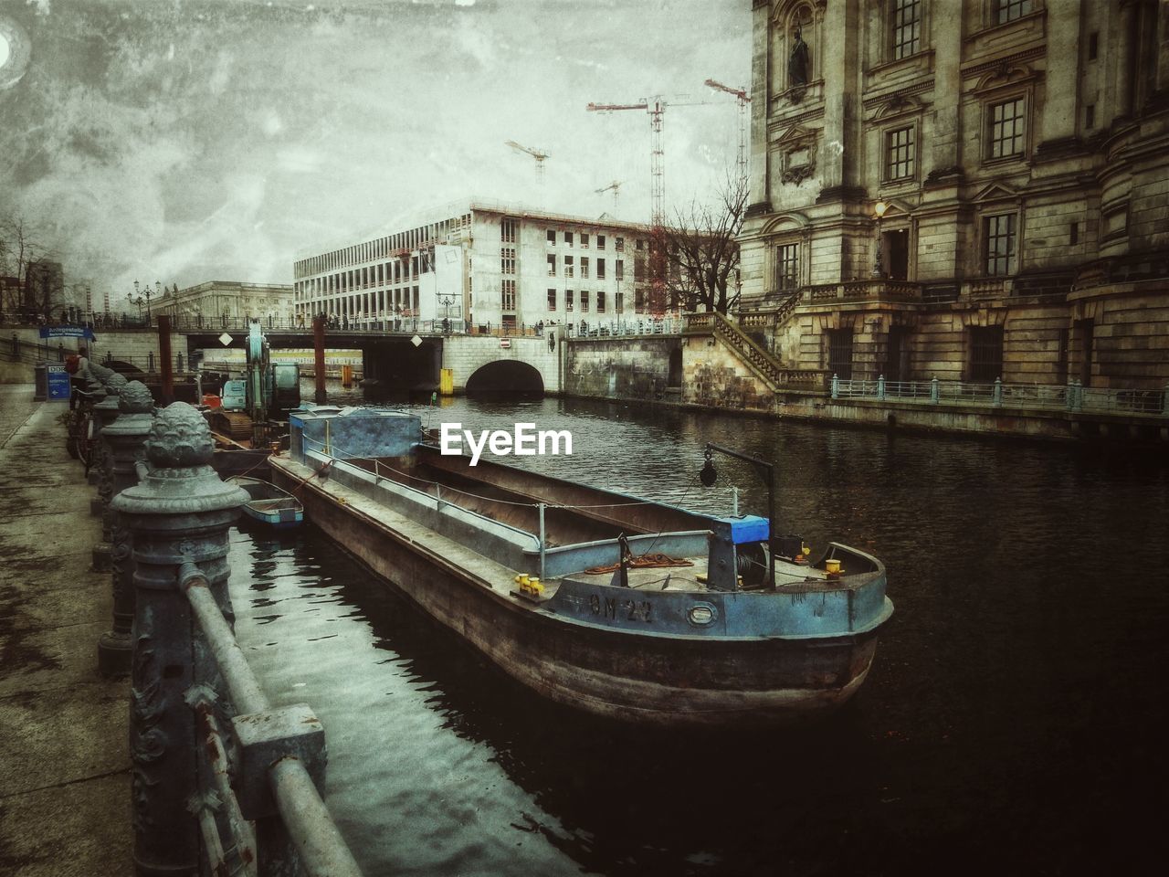 VIEW OF BOATS IN CANAL