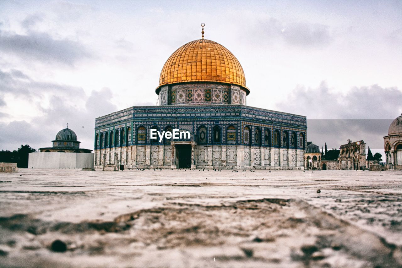 Exterior of mosque against sky in city