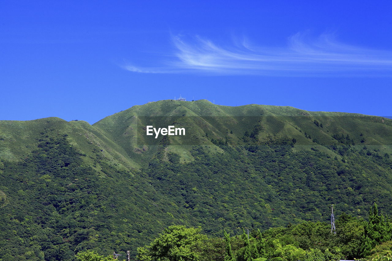 SCENIC VIEW OF MOUNTAINS AGAINST BLUE SKY