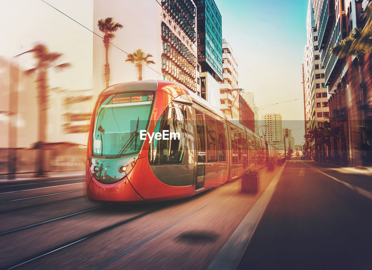 Cable car on road in city