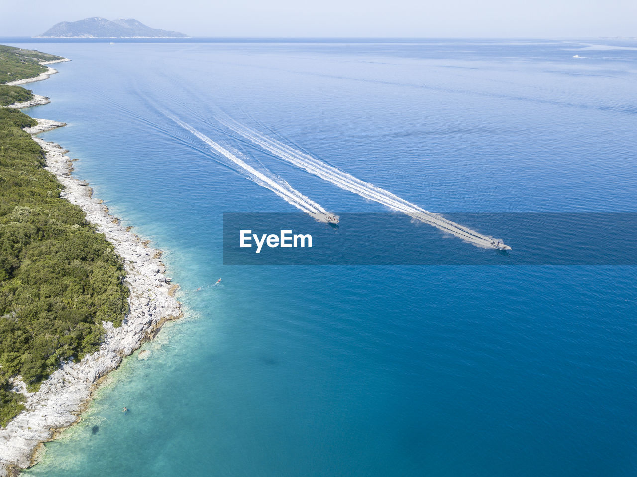 High angle view of boats on sea shore