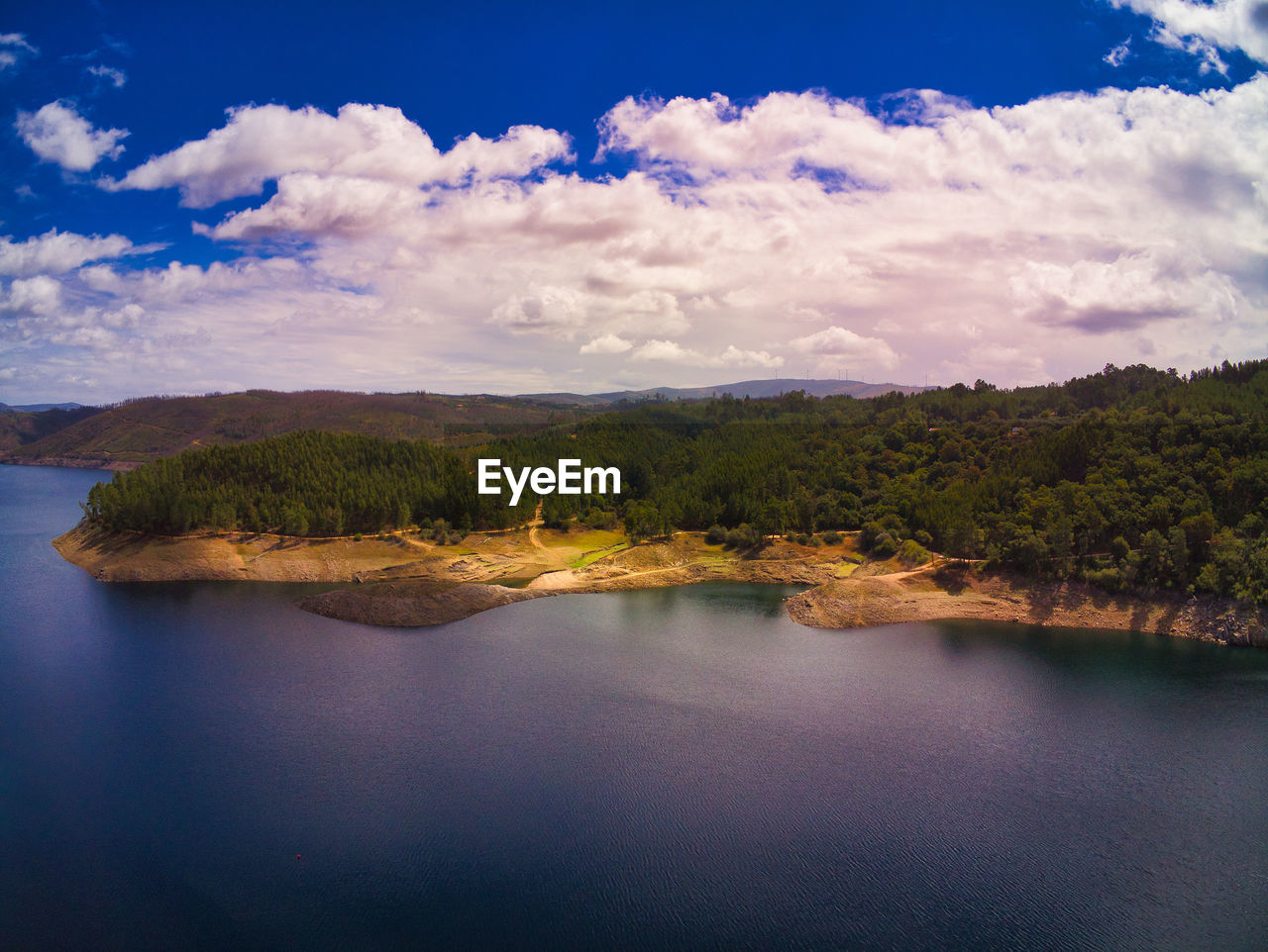 IDYLLIC SHOT OF LAKE AGAINST SKY