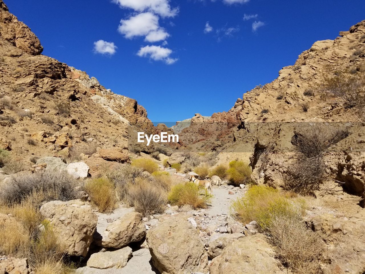 SCENIC VIEW OF ROCKS AGAINST SKY