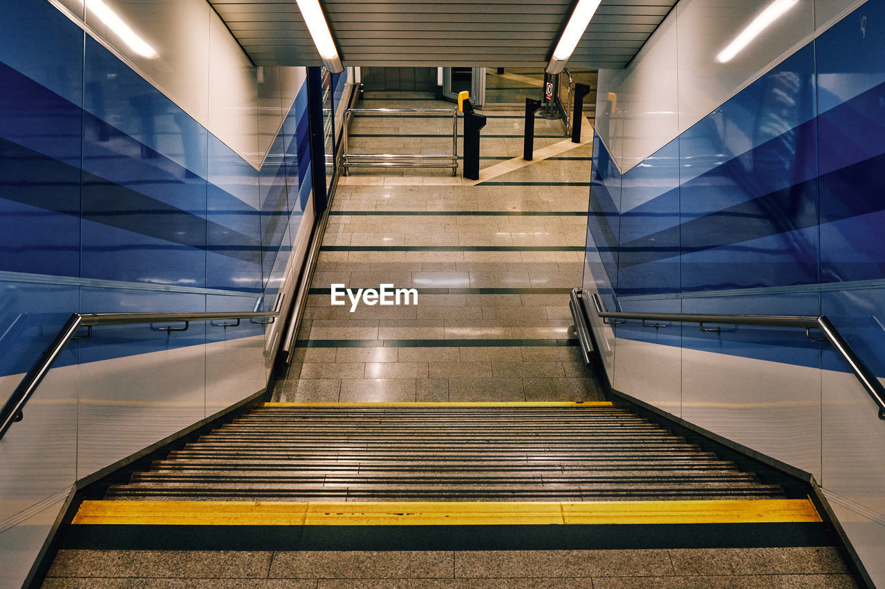 Low angle view of escalator in subway