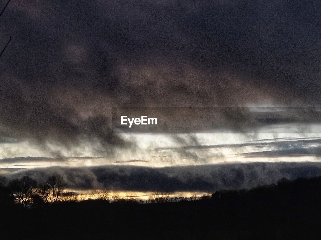 DRAMATIC SKY OVER LANDSCAPE