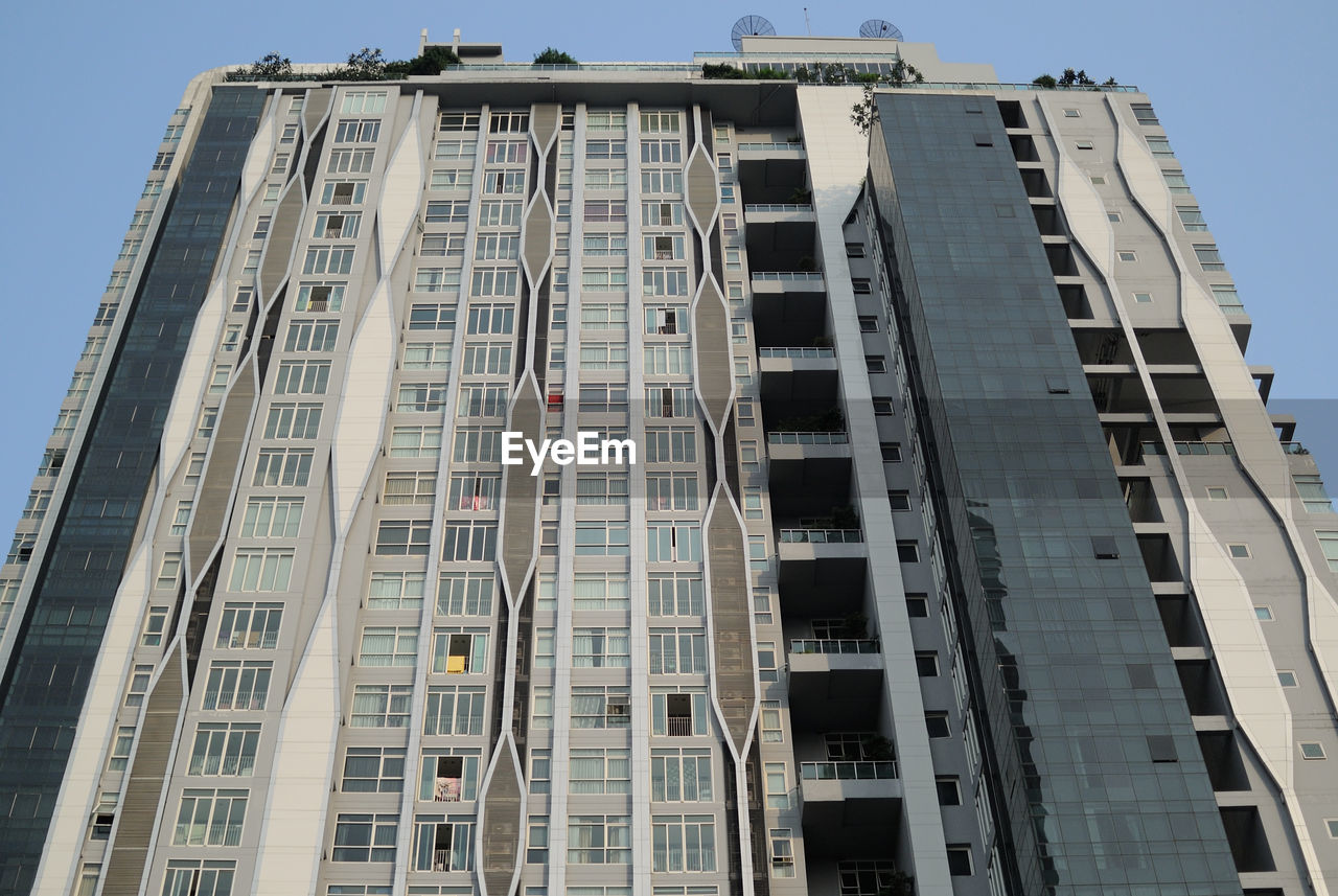 LOW ANGLE VIEW OF MODERN BUILDINGS