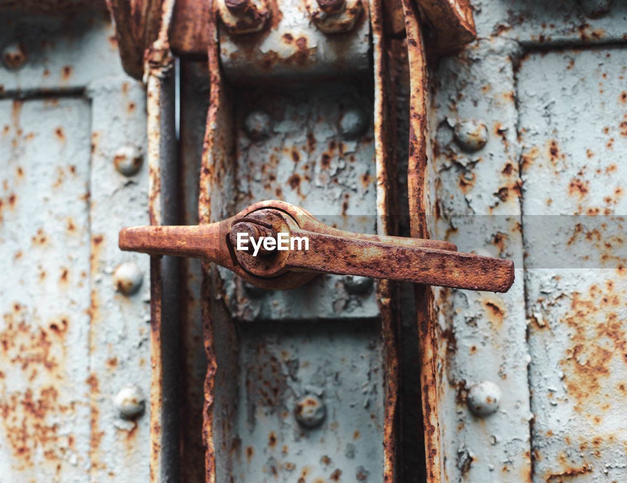 Close-up of old rusty metal door