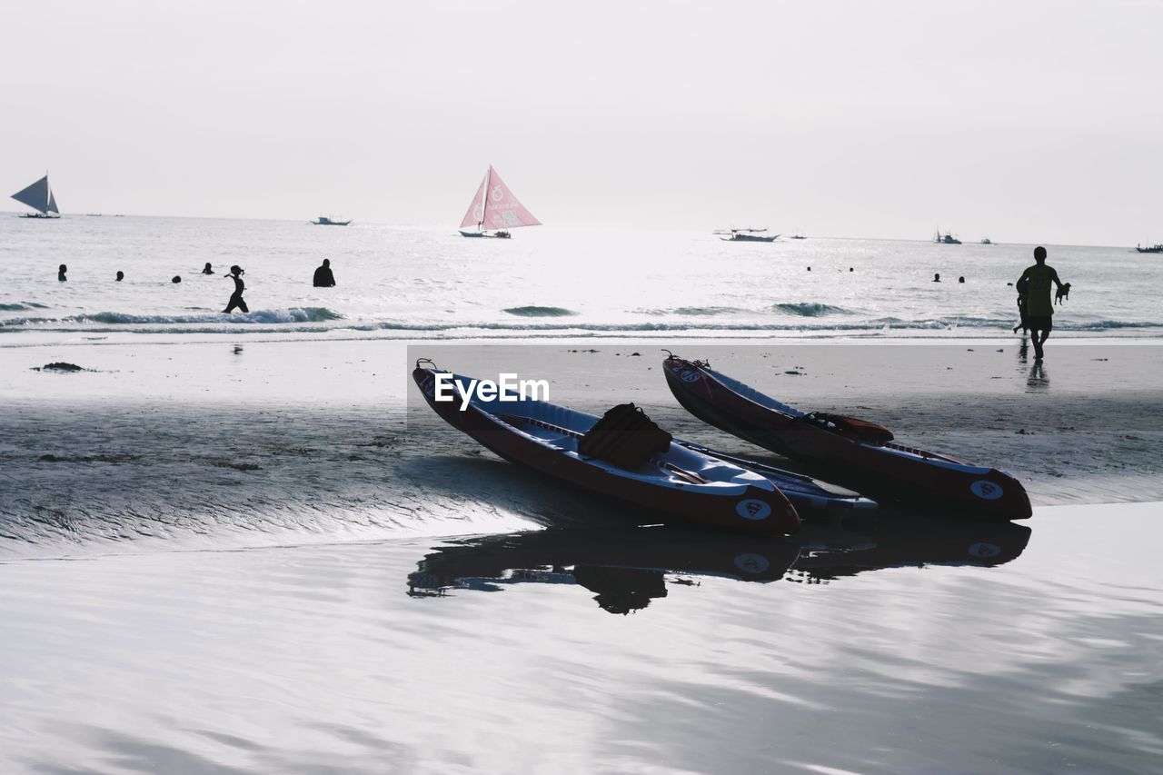 NAUTICAL VESSEL ON BEACH