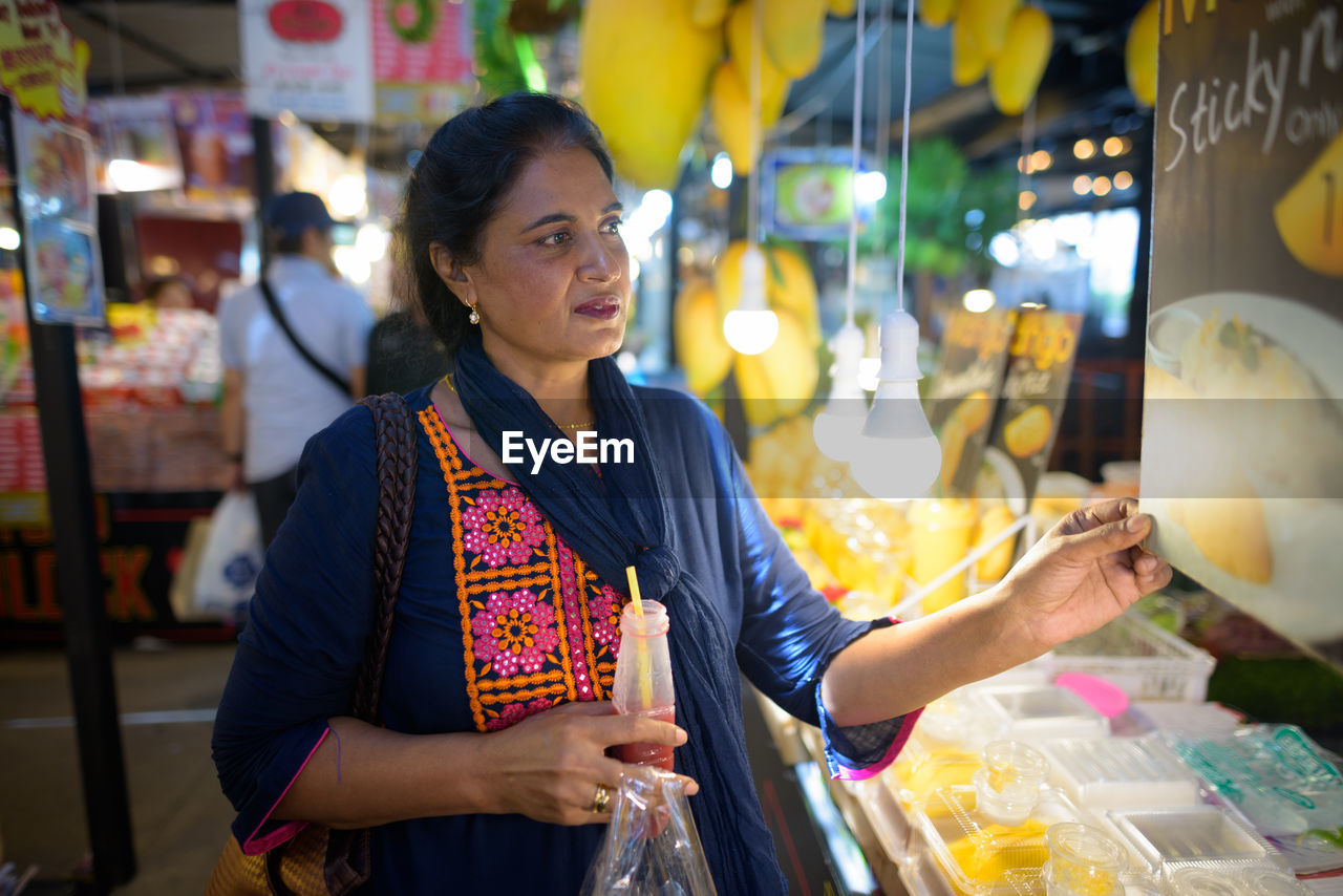 Woman standing at market