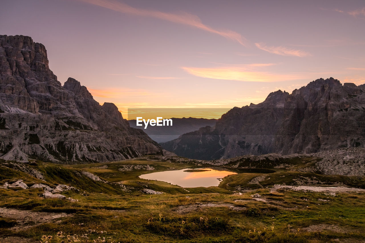 Scenic view of mountains against sky during sunset