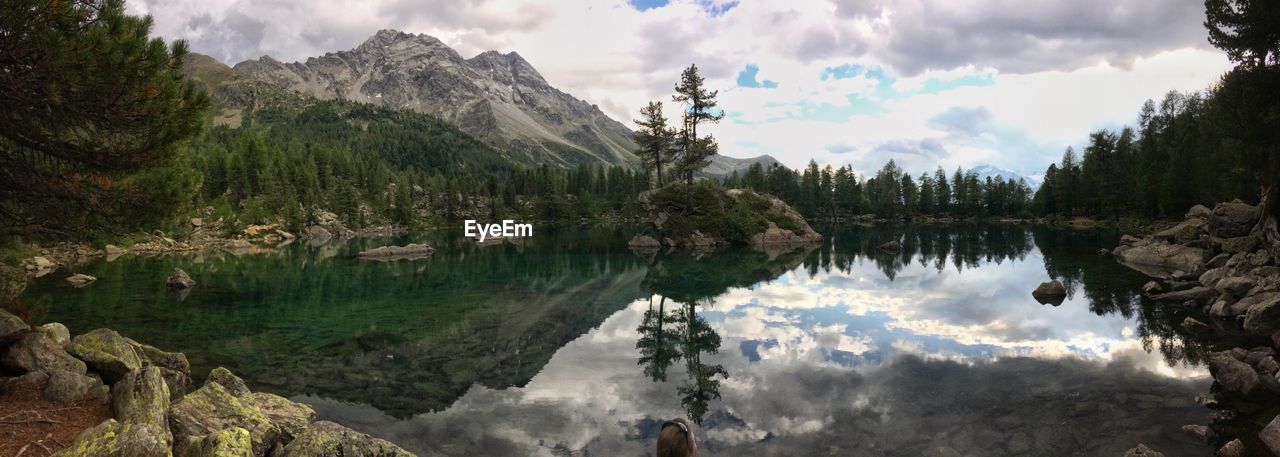 PANORAMIC VIEW OF LAKE AND MOUNTAIN AGAINST SKY