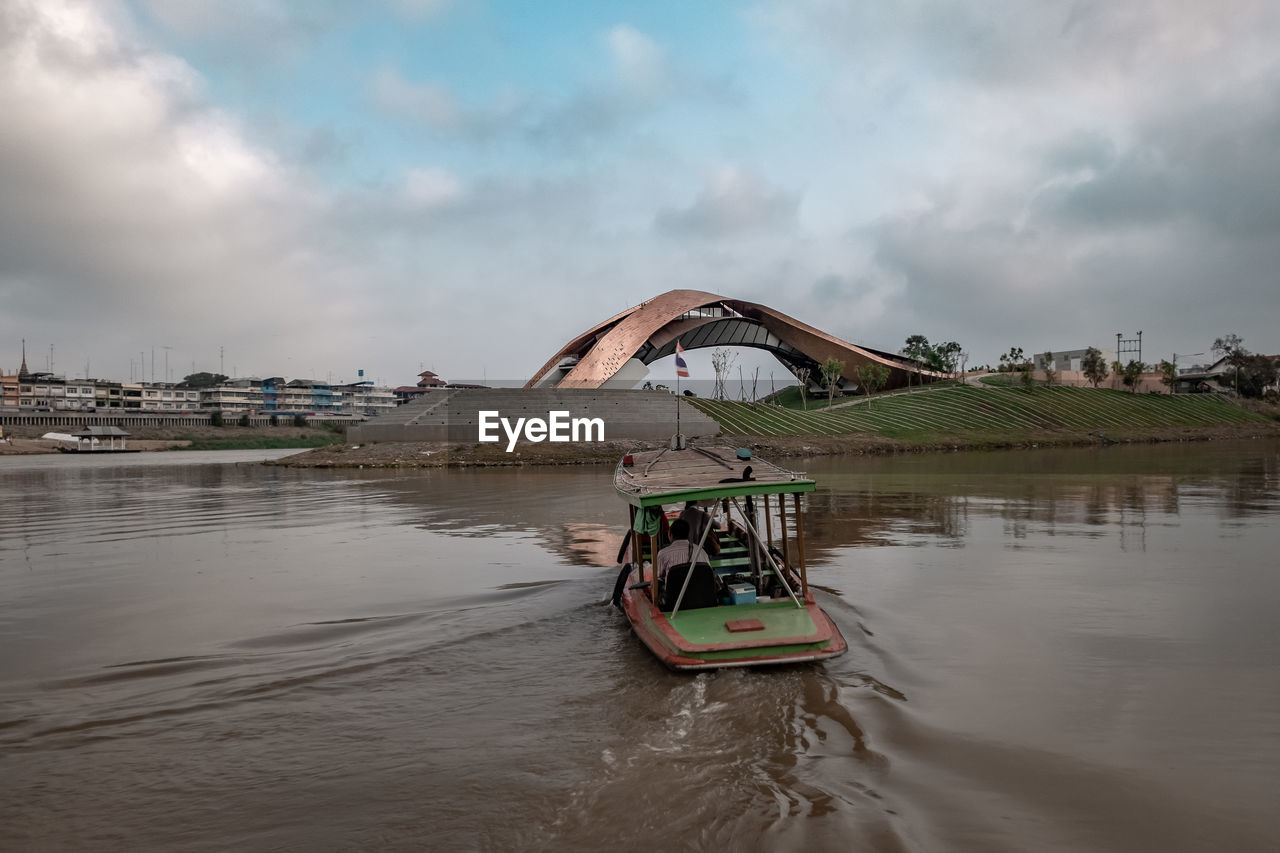 BRIDGE AGAINST SKY OVER RIVER