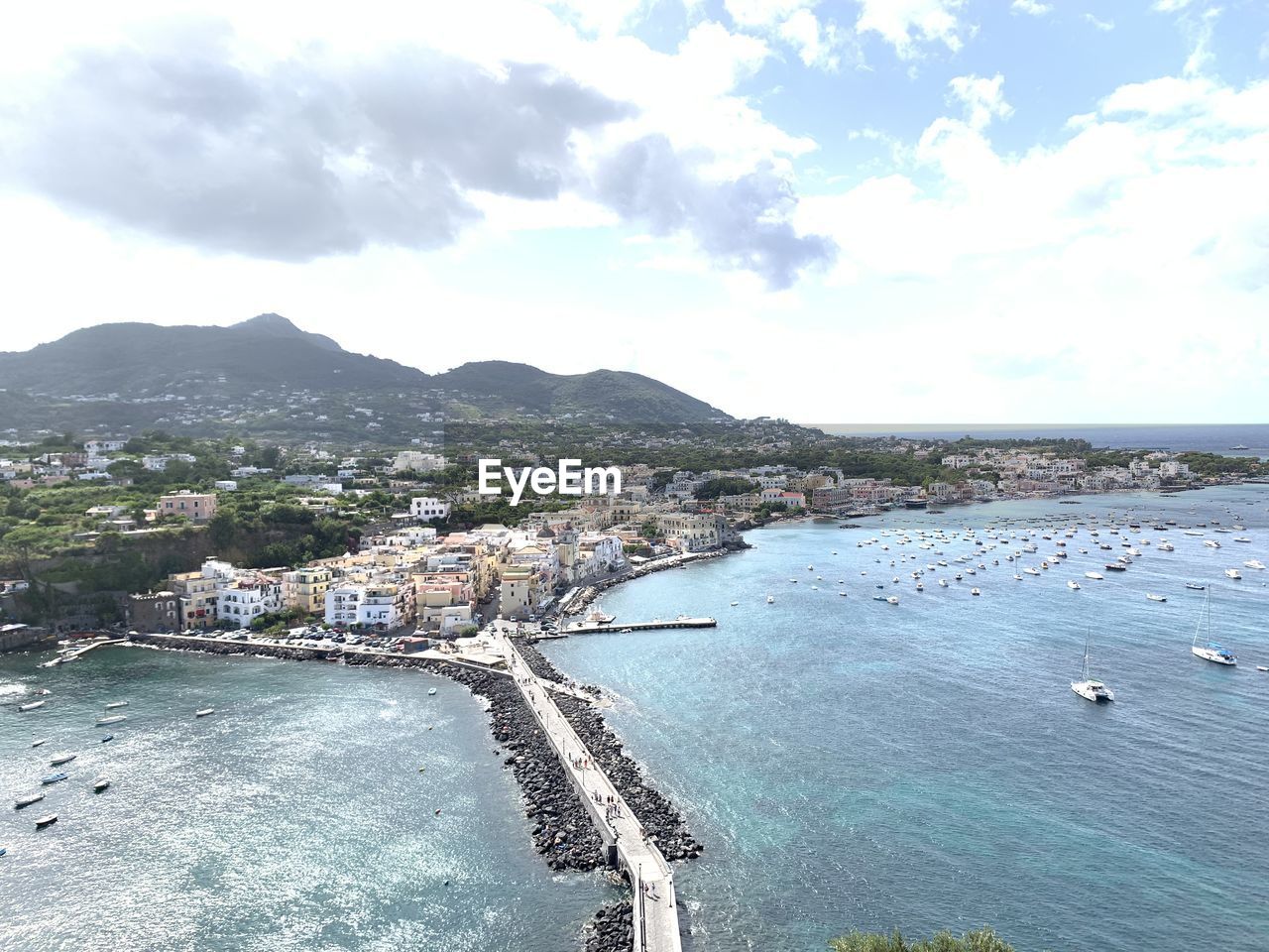 HIGH ANGLE VIEW OF BAY AGAINST SKY