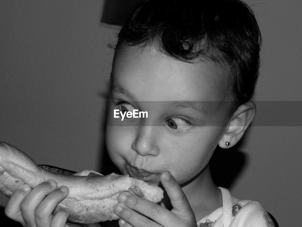 Close-up portrait of girl eating food