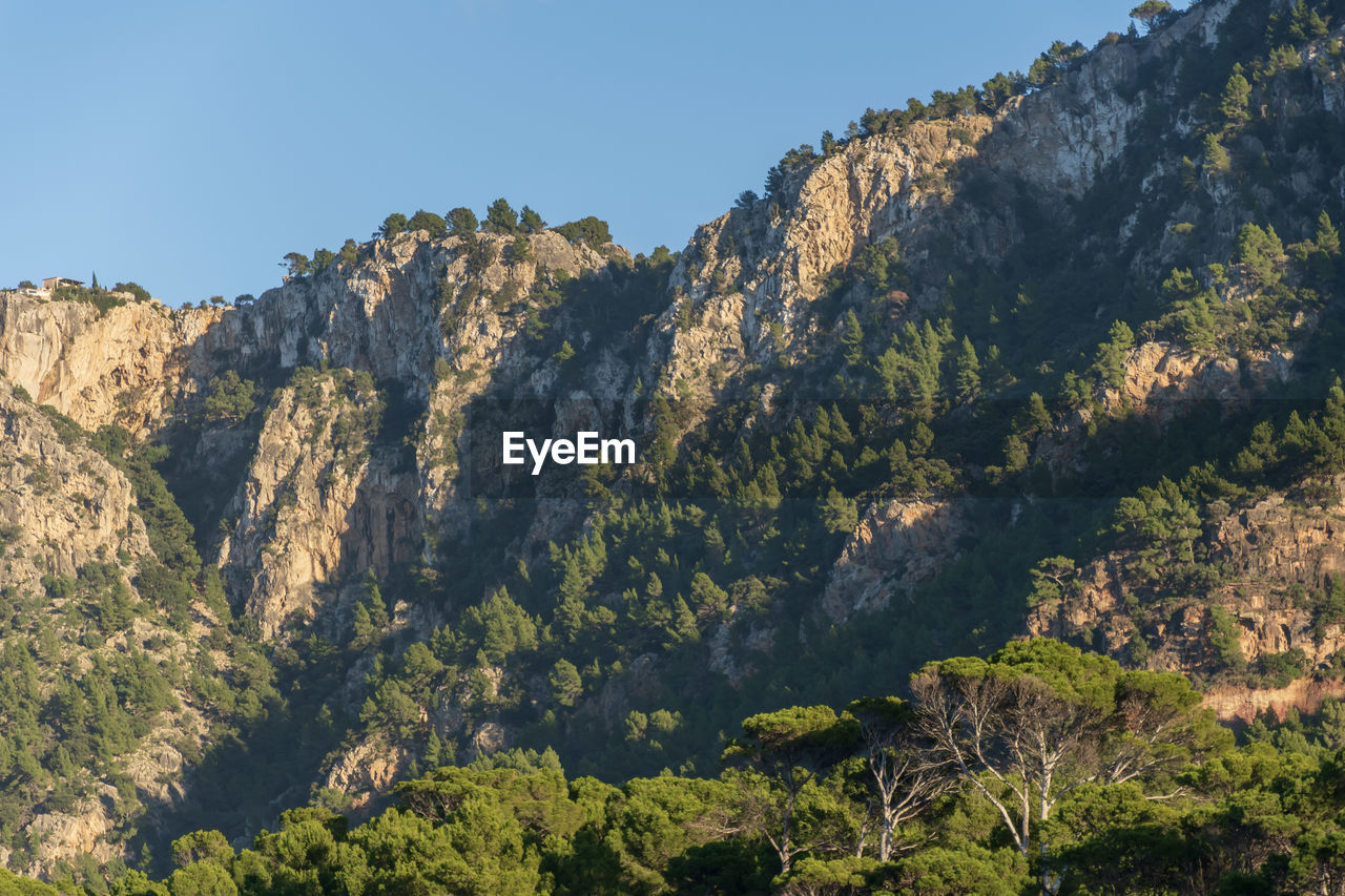 Scenic view of mountains against clear sky