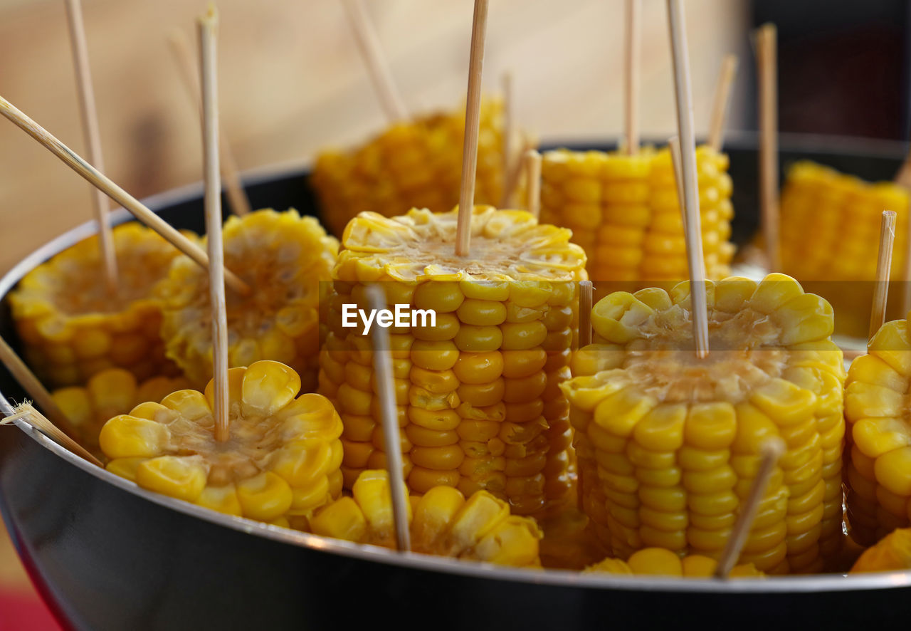 Close-up of corn in bowl on table