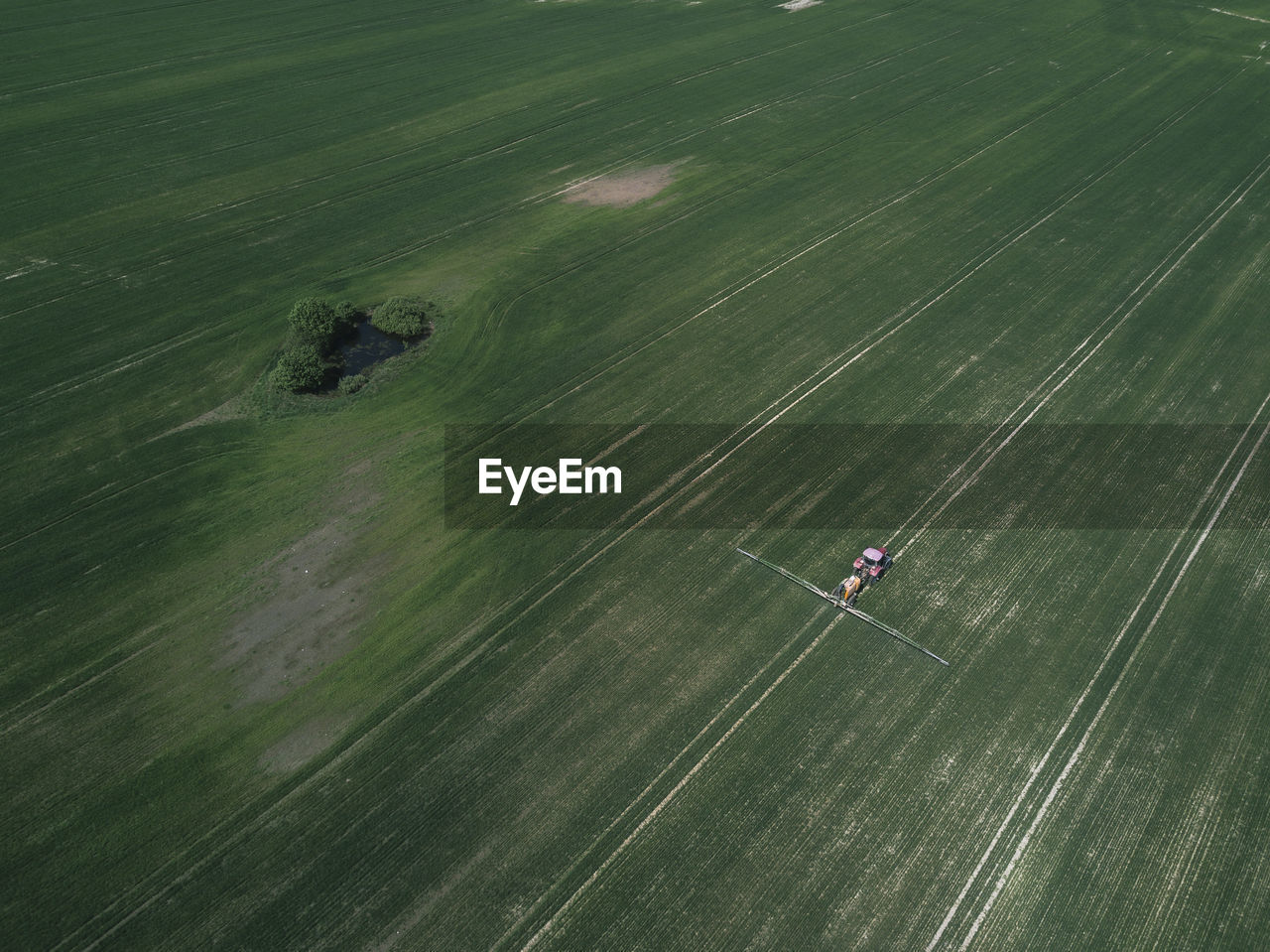 Aerial view of tractor in farm