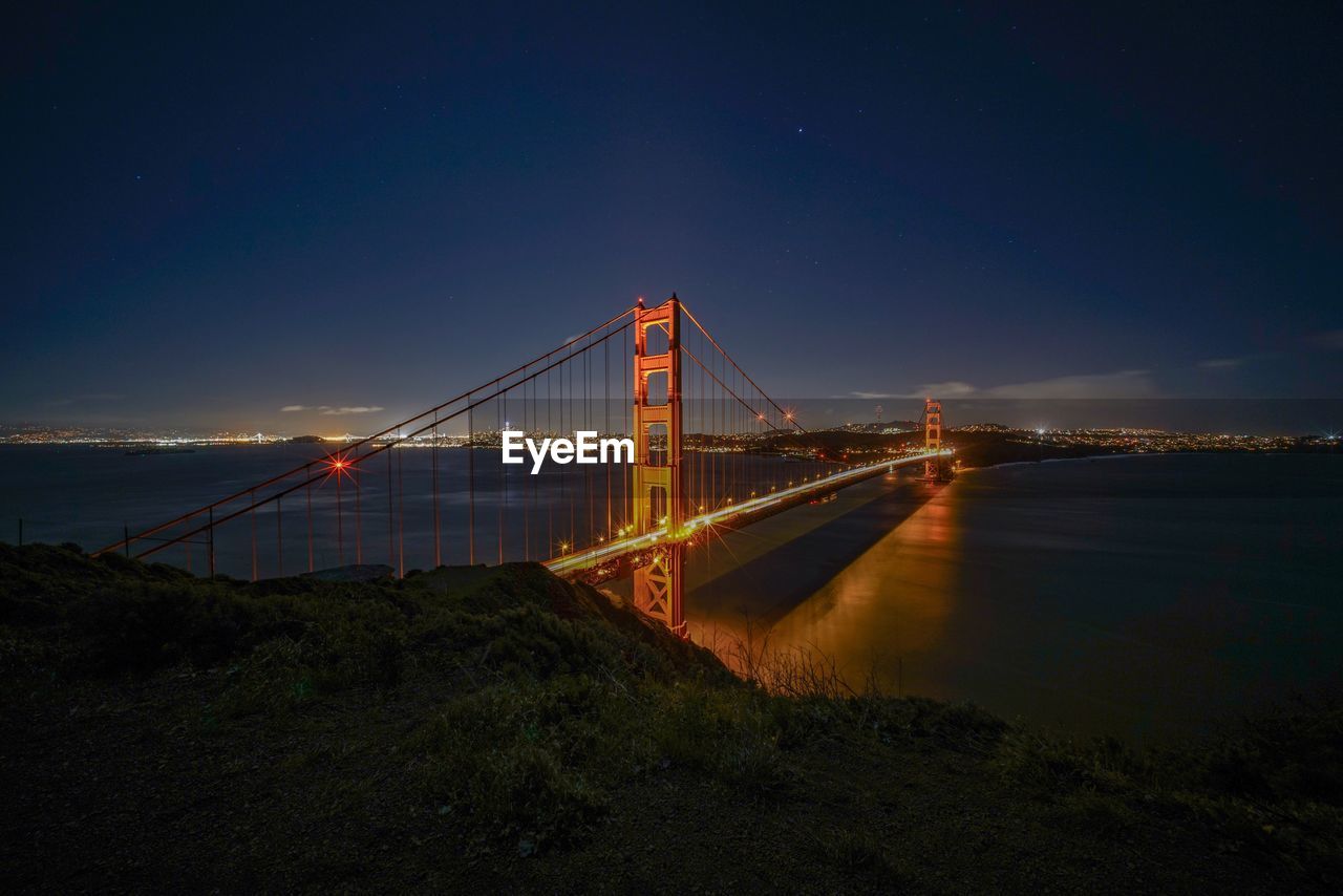 Illuminated golden gate bridge at night