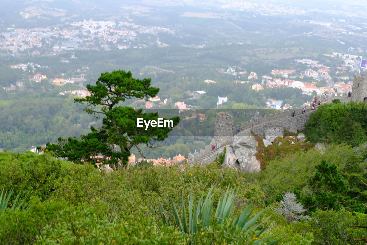 HIGH ANGLE VIEW OF CASTLE ON LAND