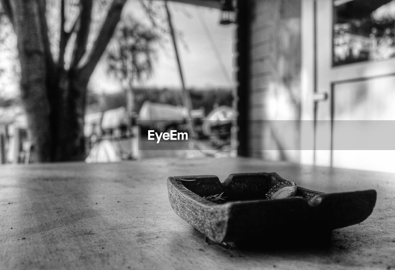 Close-up of wooden container on table