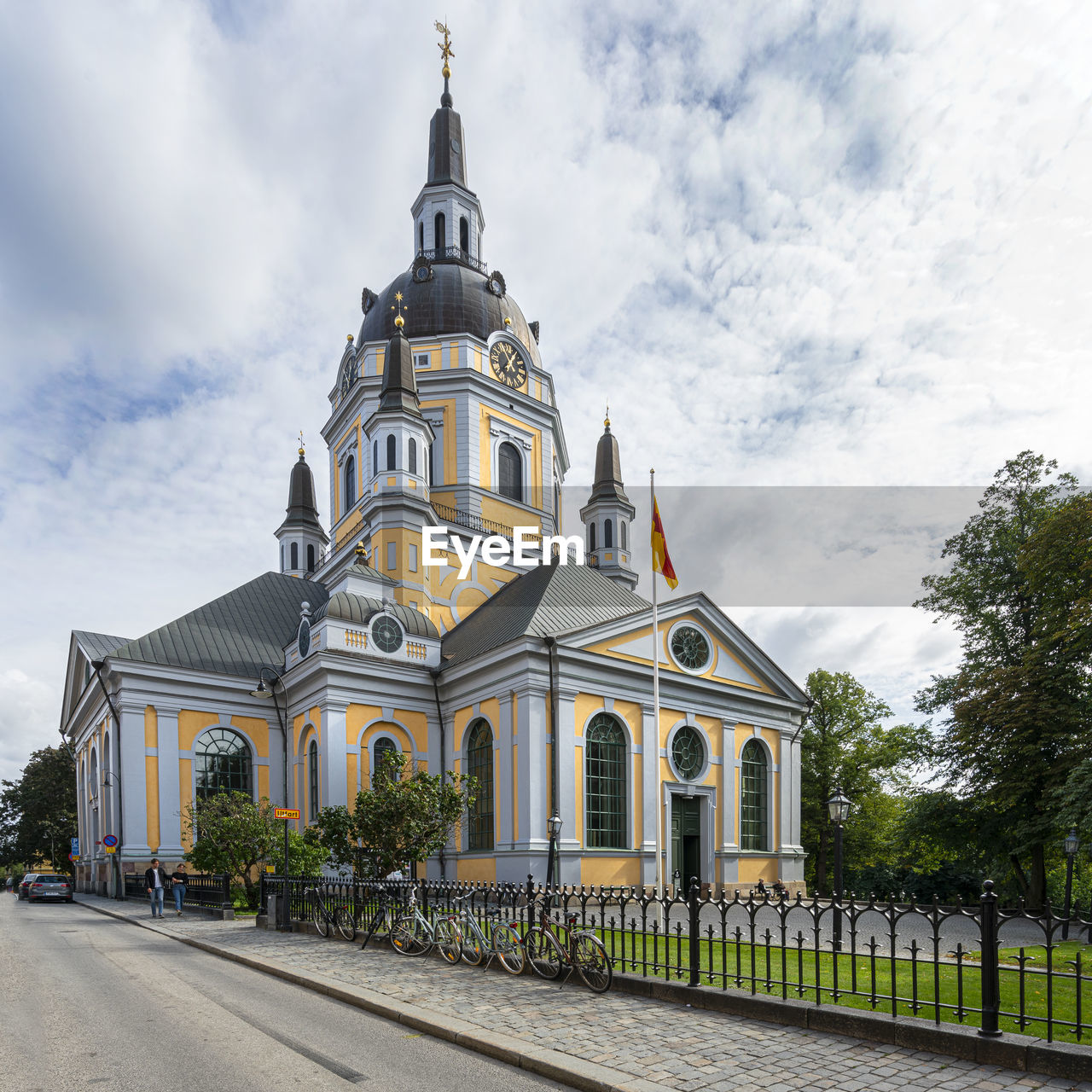 A panoramic view of the st. mary magdalene church from the cemetery park