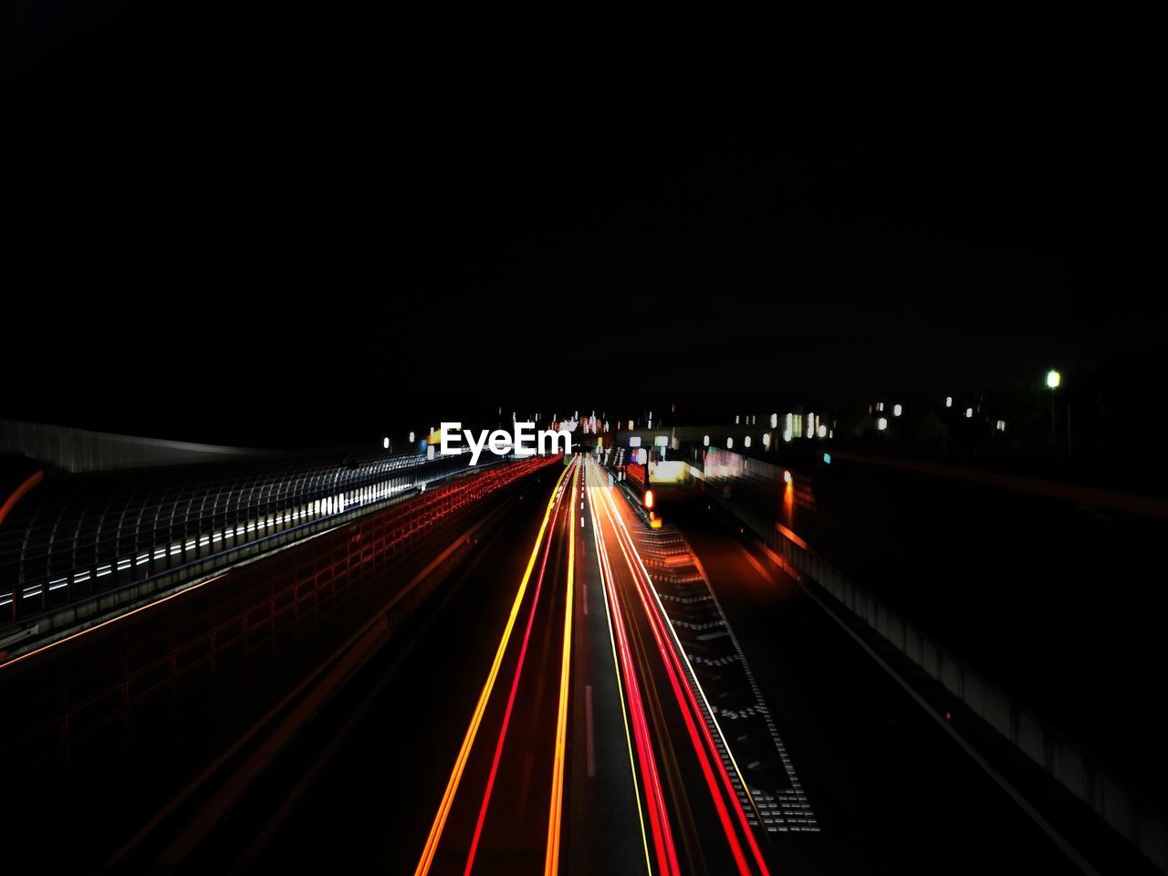 LIGHT TRAILS ON HIGHWAY