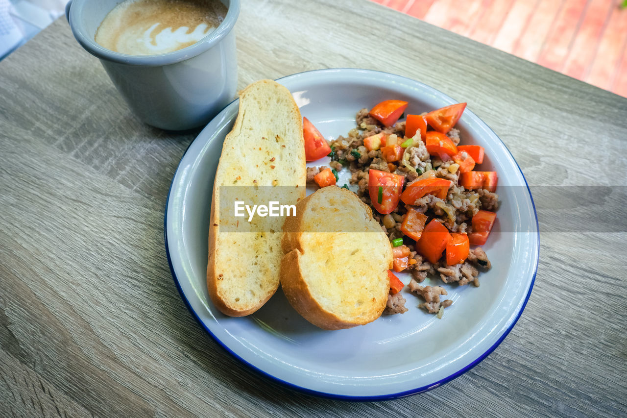 High angle view of breakfast served on table