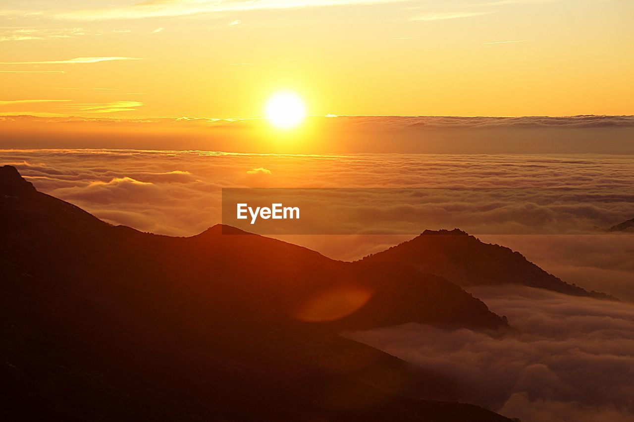 SCENIC VIEW OF DRAMATIC SKY OVER LANDSCAPE