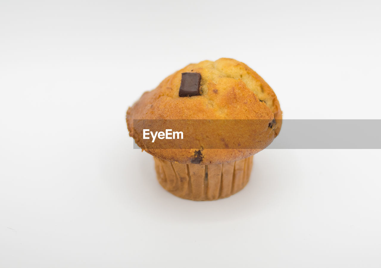 CLOSE-UP OF COOKIES ON WHITE BACKGROUND