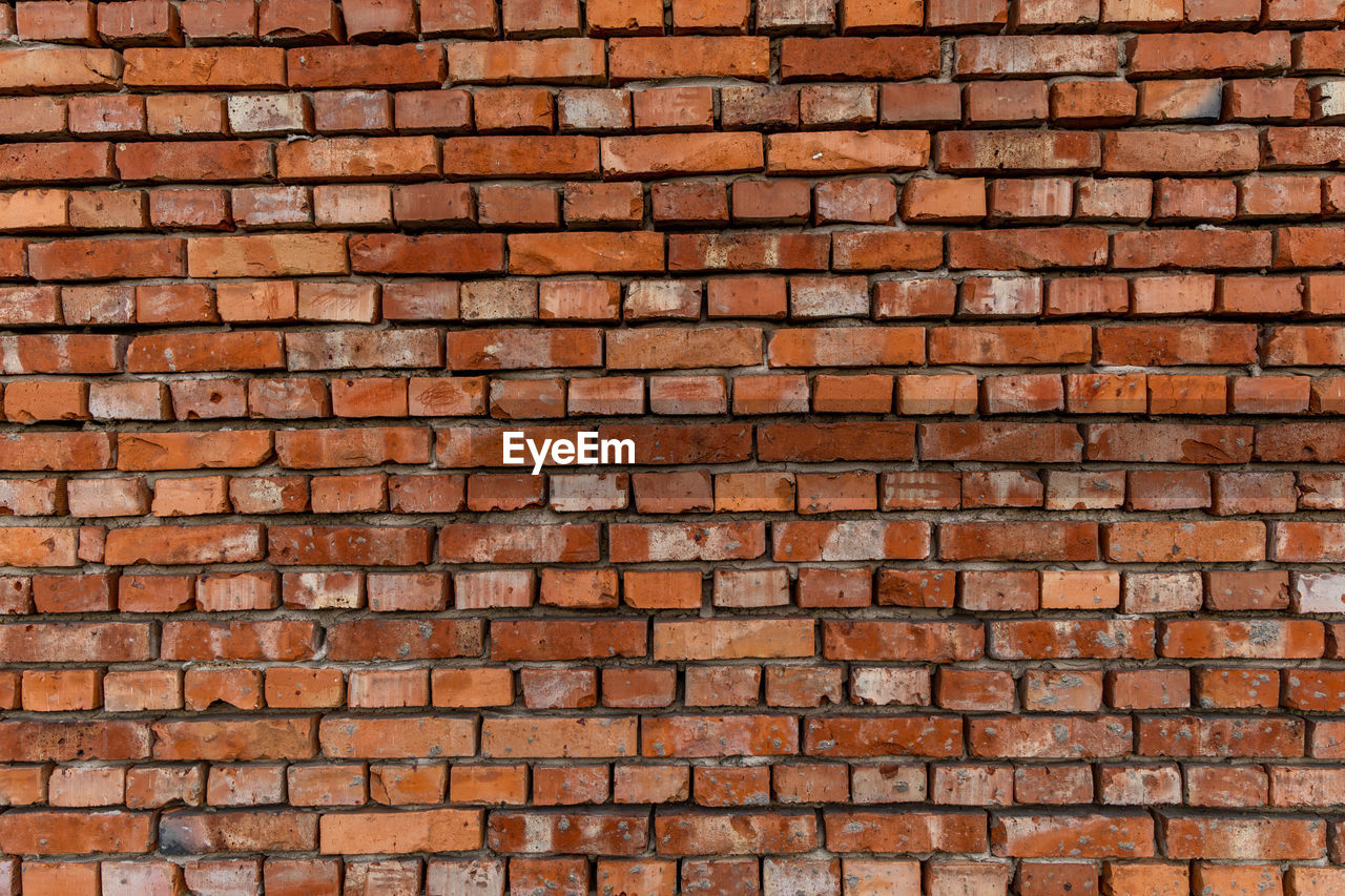 full frame shot of weathered brick wall