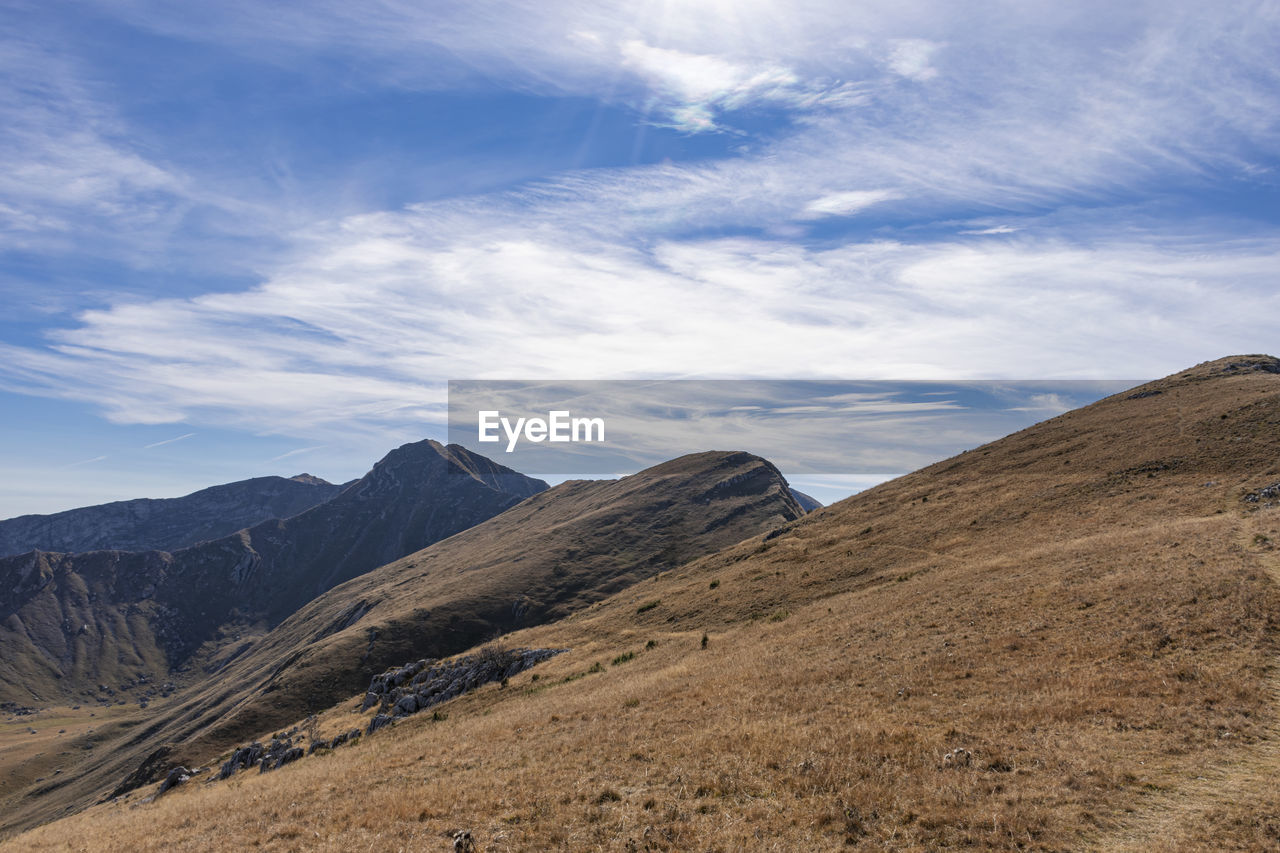 SCENIC VIEW OF MOUNTAIN AGAINST SKY