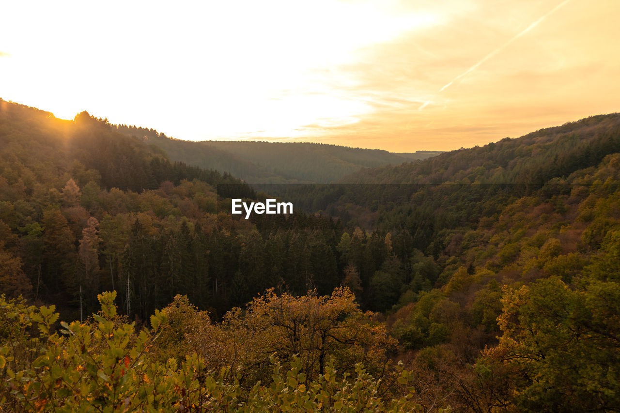 Scenic view of mountains against sky during sunset