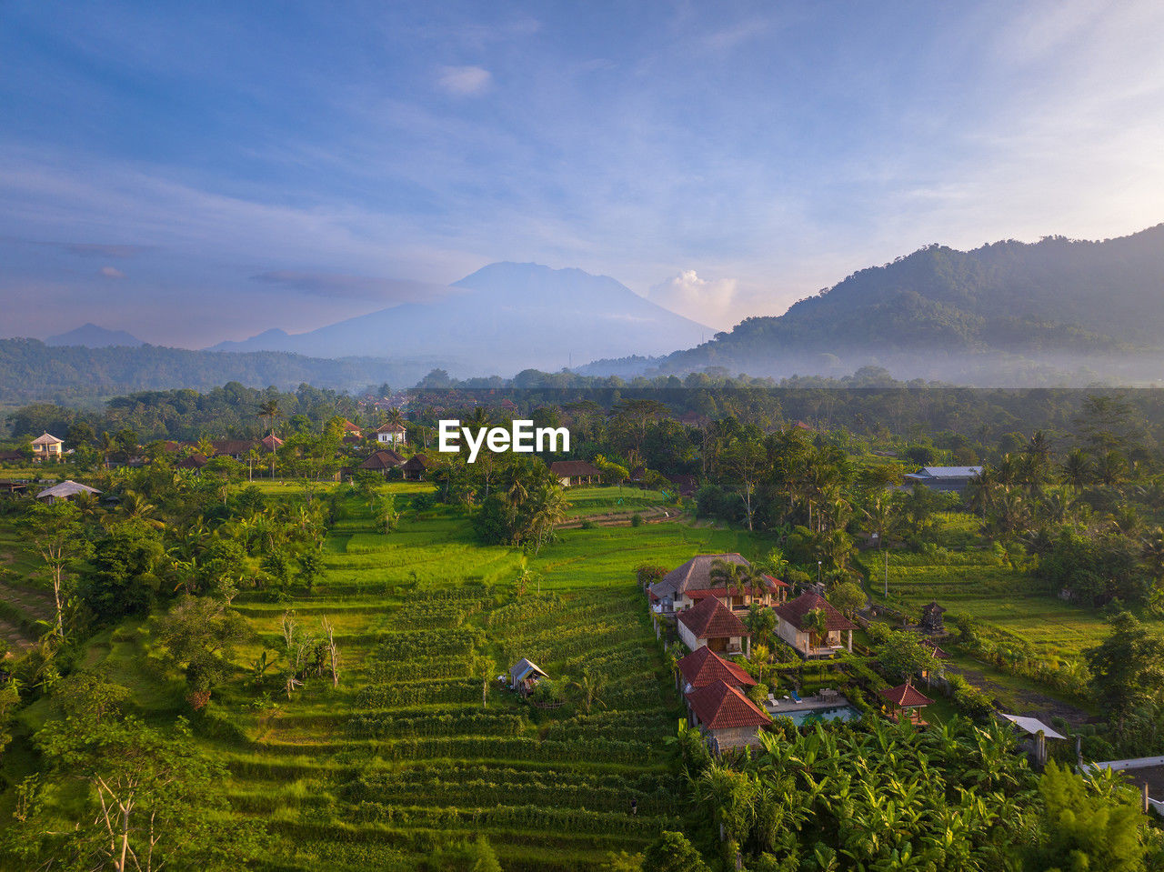 high angle view of townscape and mountains against sky