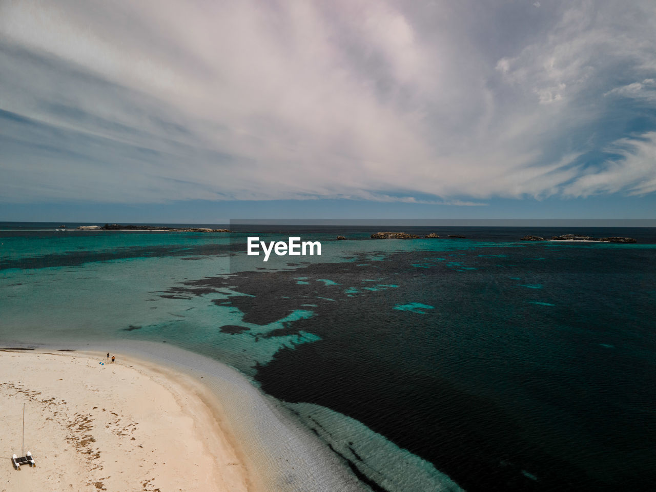 PANORAMIC VIEW OF BEACH AGAINST SKY