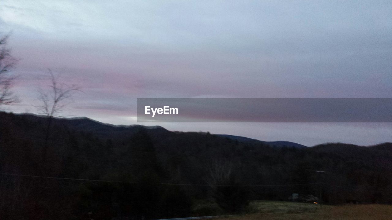 Overcast clouds over mountain range