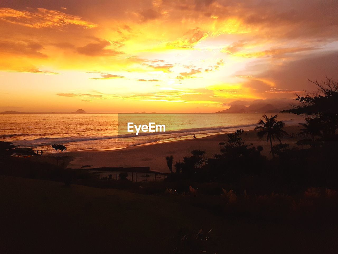 Scenic view of sea against sky during sunset