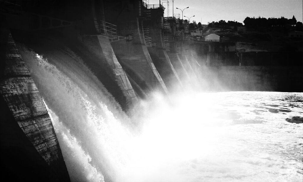 Water flowing through dam