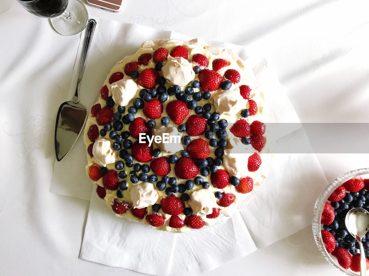 High angle view of cake on tablecloth