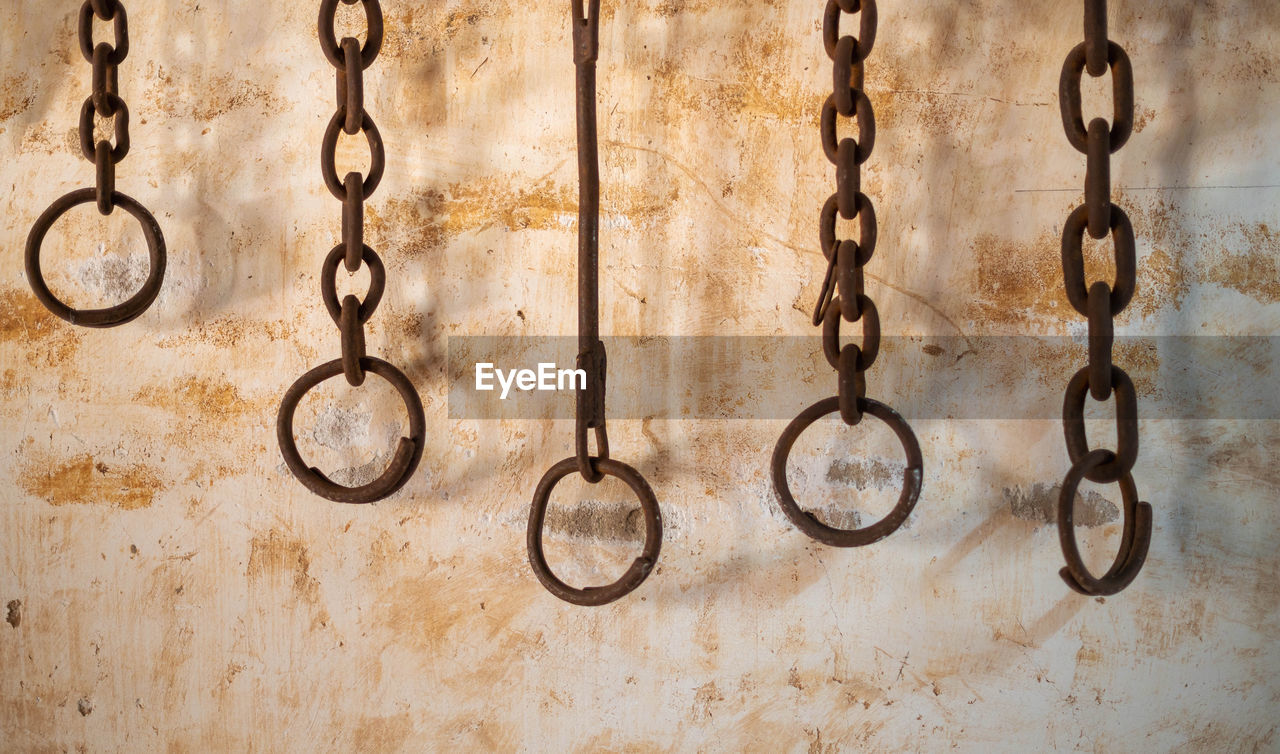 chain, iron, metal, hanging, no people, wall - building feature, close-up, indoors, old, rusty, wood