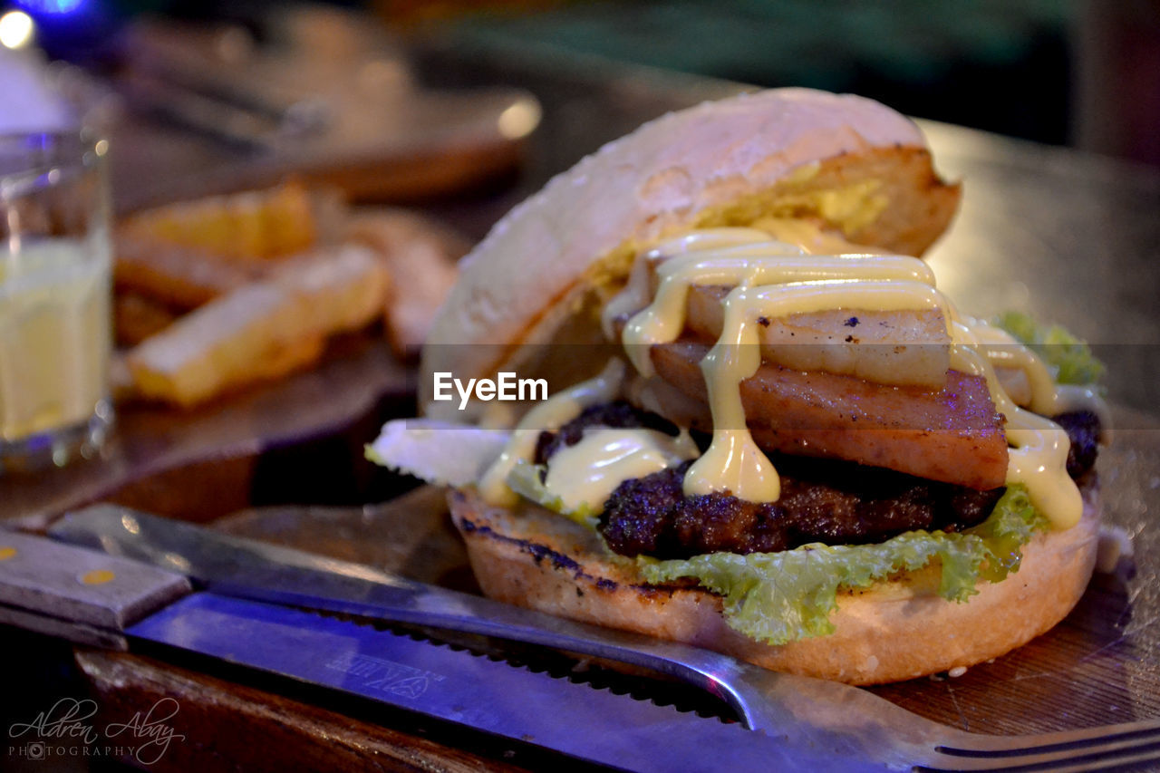 Close-up of burger on table