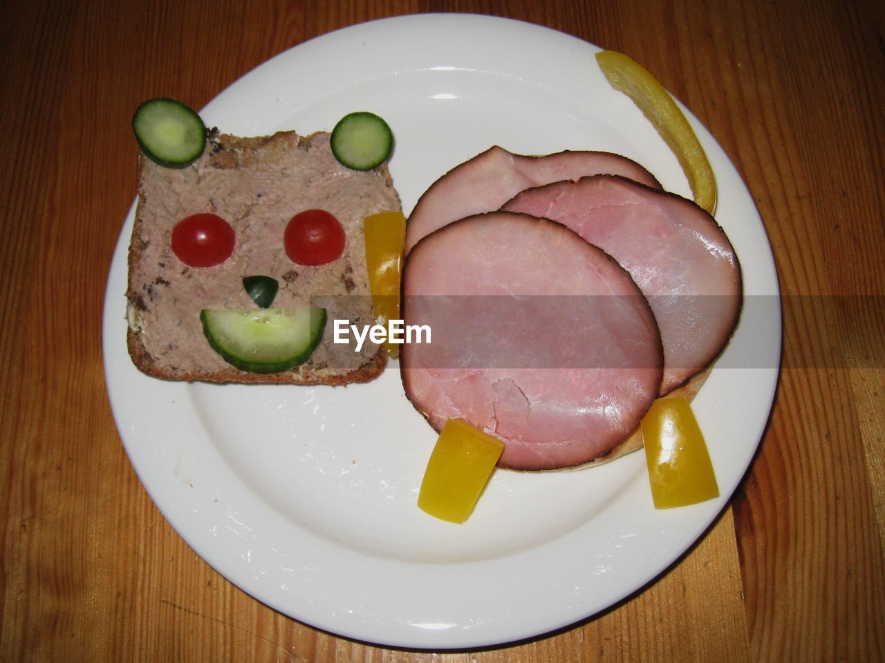 Close-up of cat made from sandwich on plate