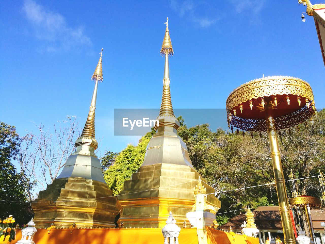 Low angle view of temple against blue sky