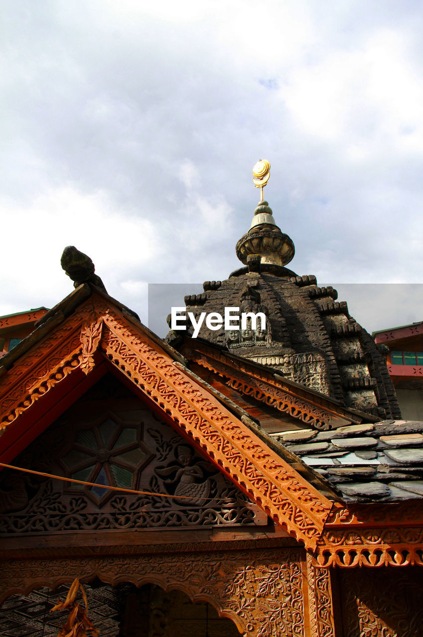 Low angle view of temple against sky