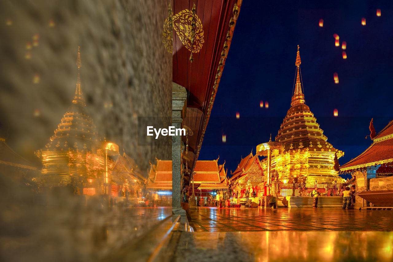 ILLUMINATED BUILDINGS AT NIGHT