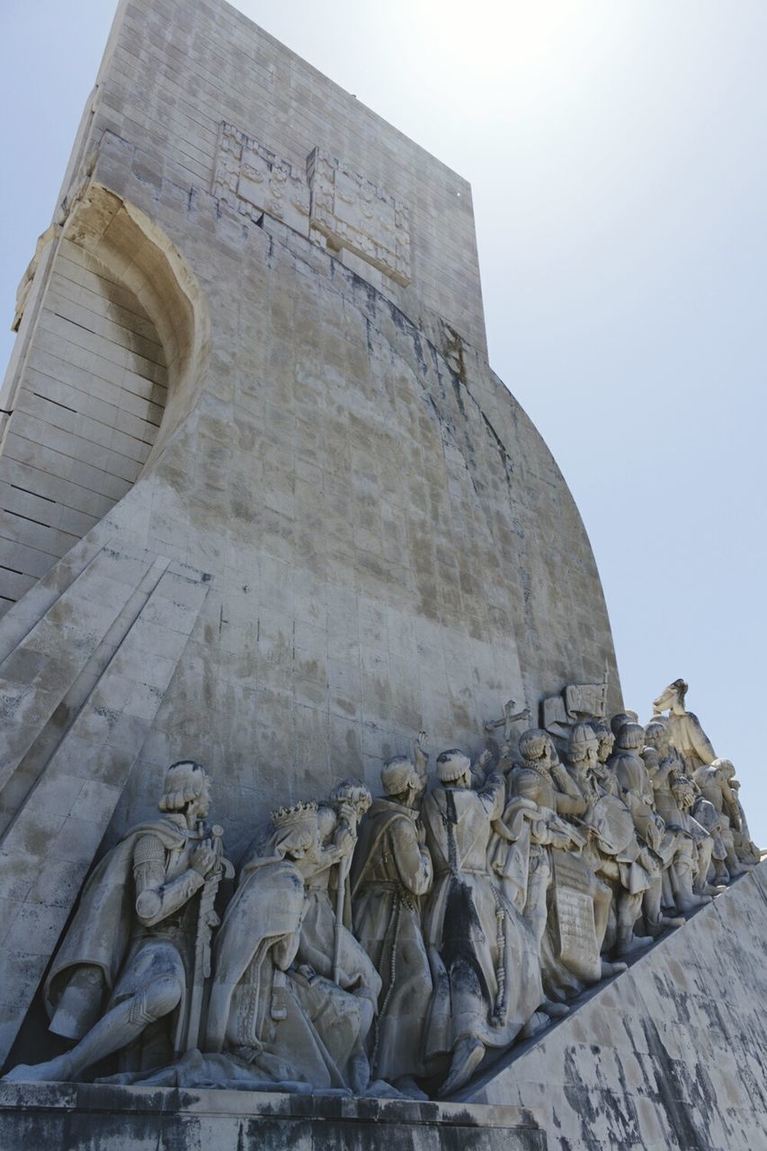 Low angle view of padrao dos descobrimentos against clear sky