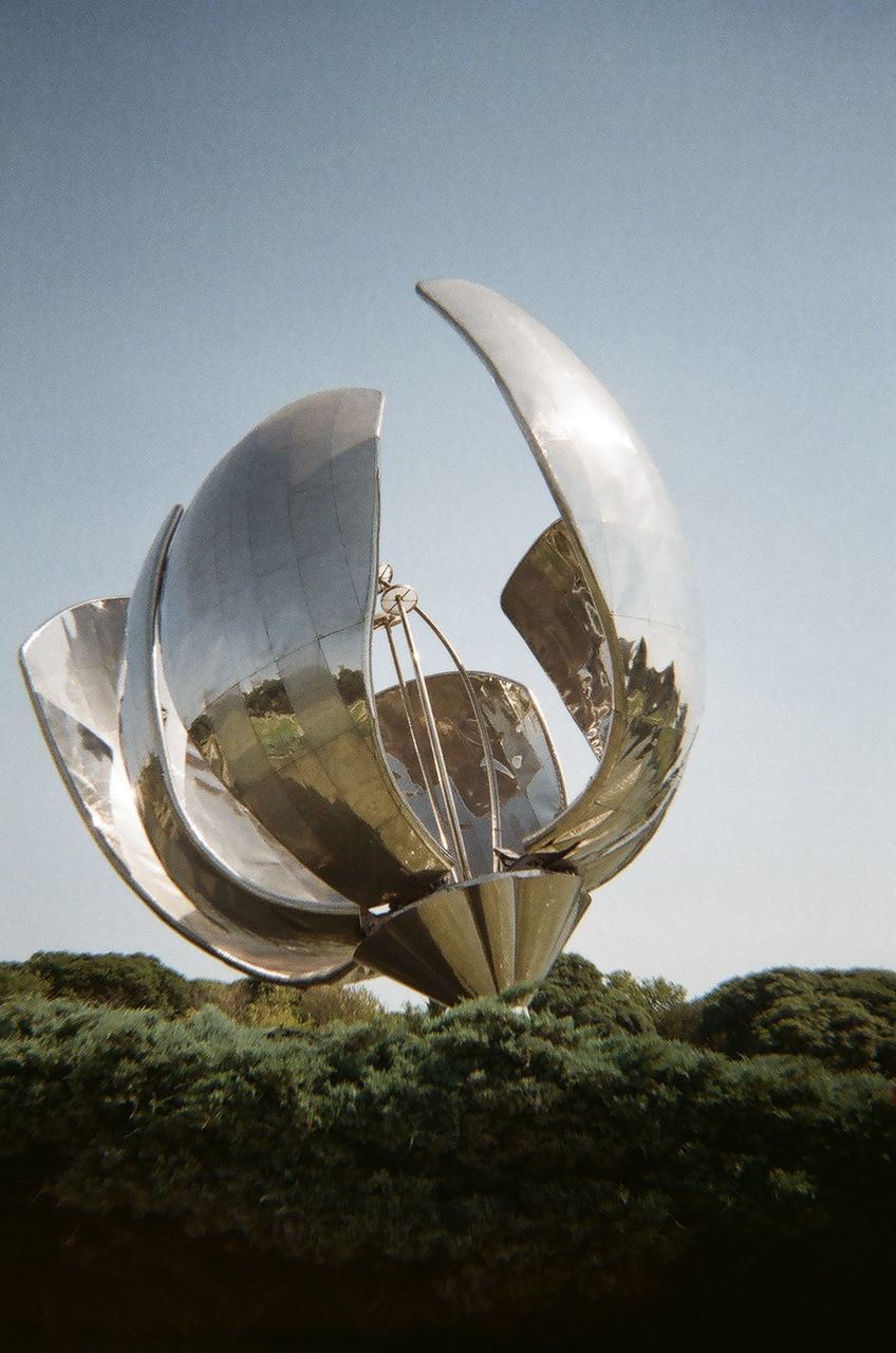 reflection, sculpture, sky, no people, nature, vehicle, light, clear sky, outdoors, sphere