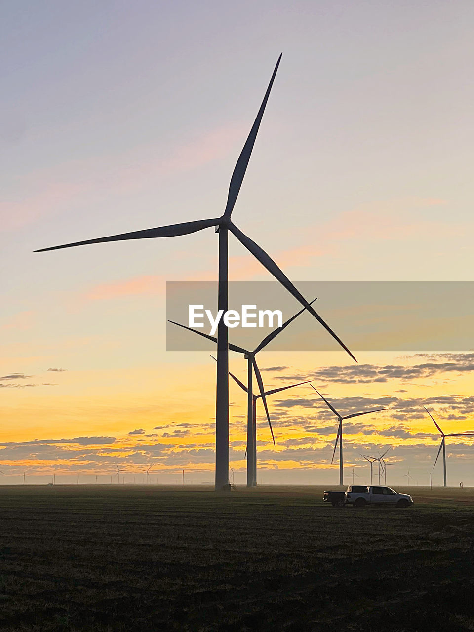 Texas sunset over wind turbines or wind farm