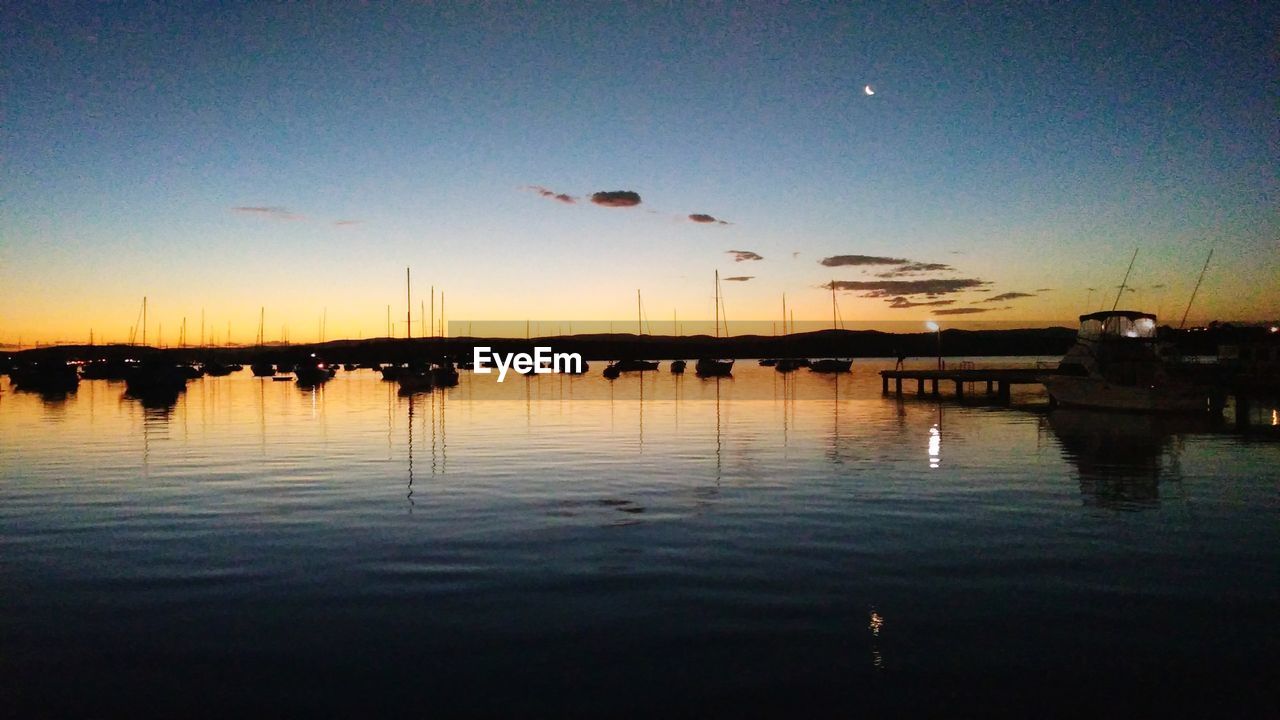 SILHOUETTE OF MARINA AT SUNSET