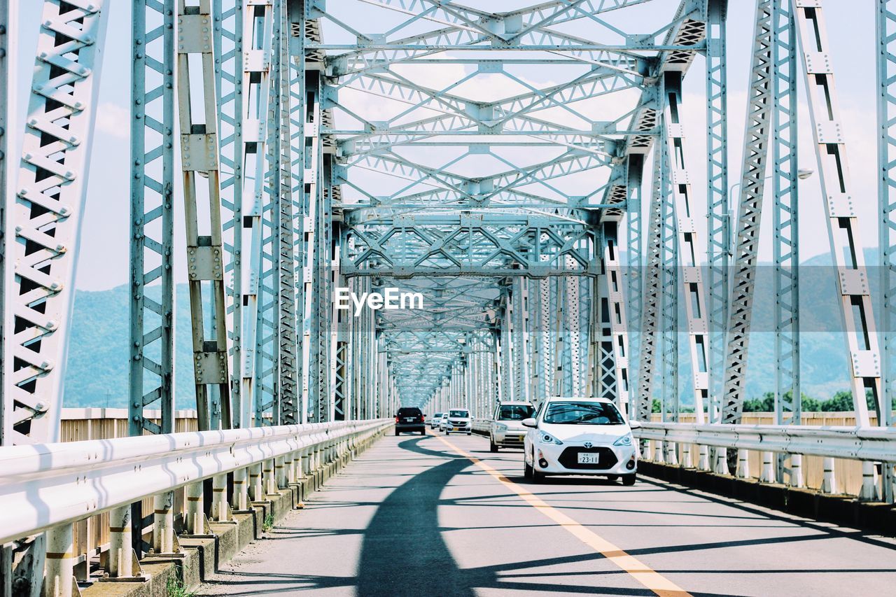 Cars on metallic bridge