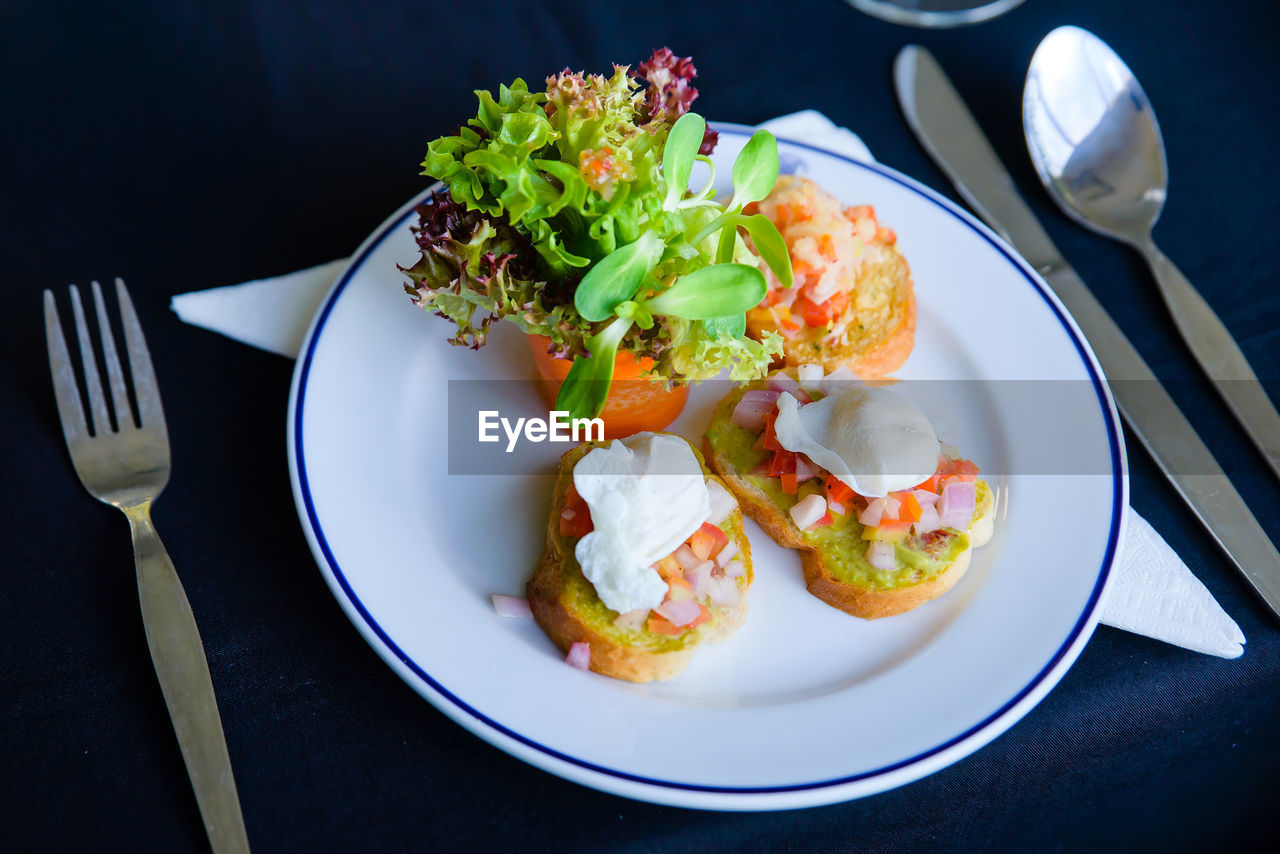 High angle view of breakfast served on table